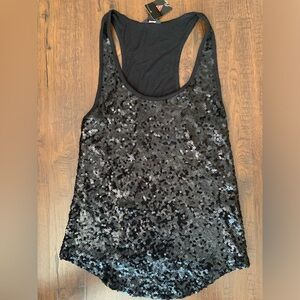Cute black sequin tank top from Guess brand. New with tags. Size S.